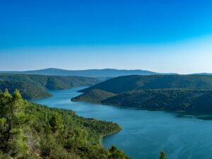 a large body of water surrounded by mountains